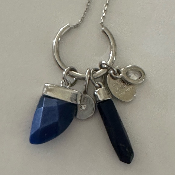 Henri Bendel  silver tone necklace with dark blue crystal and logo charms disc - Picture 6 of 9